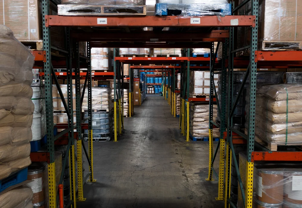 Chemical warehouse interior with racking and storage
